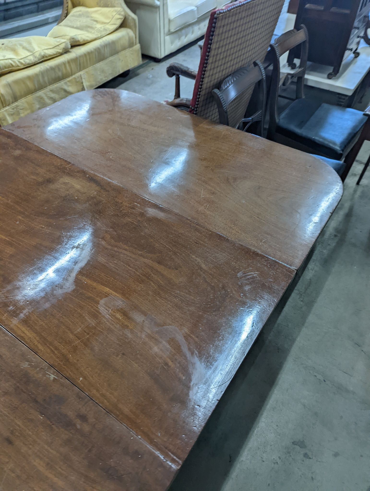 A George IV mahogany D end drop leaf extending dining table, 266cm extended, width 121cm, height 74cm